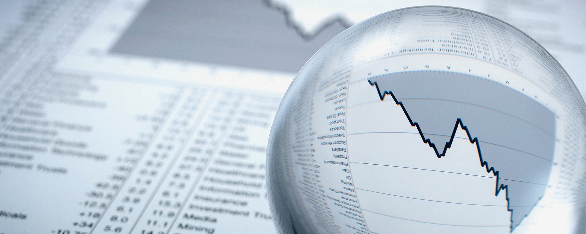 Crystal ball, descending line graph and share prices